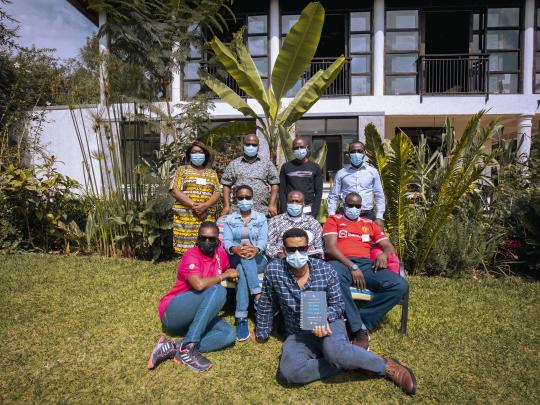 Program Managers group picture from site visit (Kikundi, 2022)